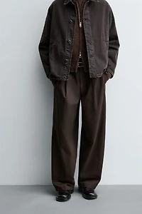 PLEATED CHINO PANTS