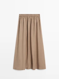 Jupe midi évasée à taille élastique