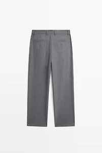 Pantalon relaxed fit à pinces en laine froide