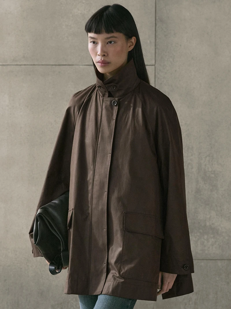 Long parka with pocket details