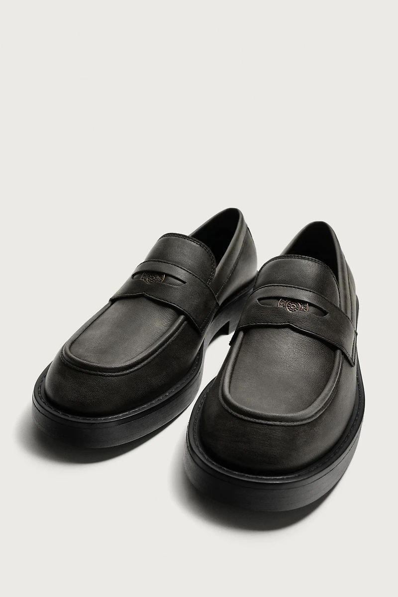 DISTRESSED PENNY LOAFERS