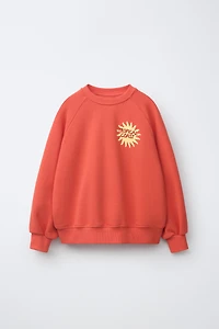 SWEAT IMPRIMÉ SOLEIL