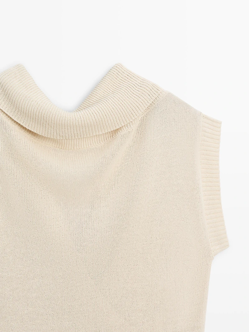 Knit sweater with low-cut back