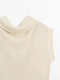 Knit sweater with low-cut back