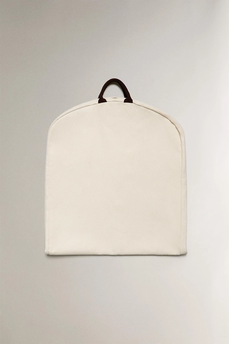 TRAVEL GARMENT BAG WITH LEATHER DETAIL