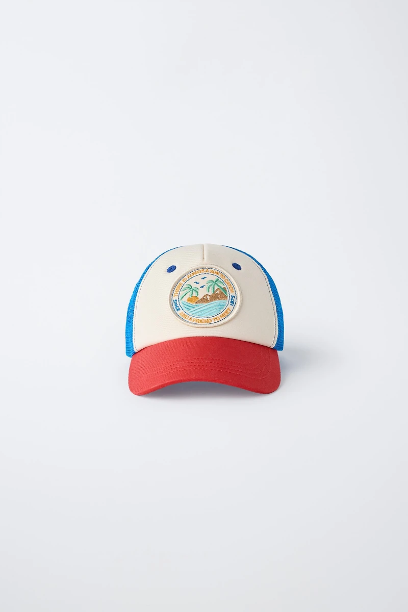 CASQUETTE À PIÈCE ET RÉSILLE