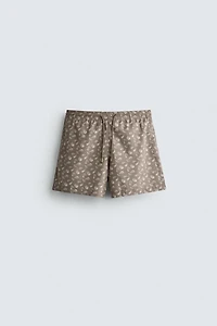 PAISLEY PRINT MID-LENGTH SWIM TRUNKS