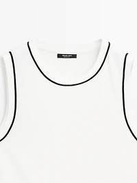 Knit top with contrast detail