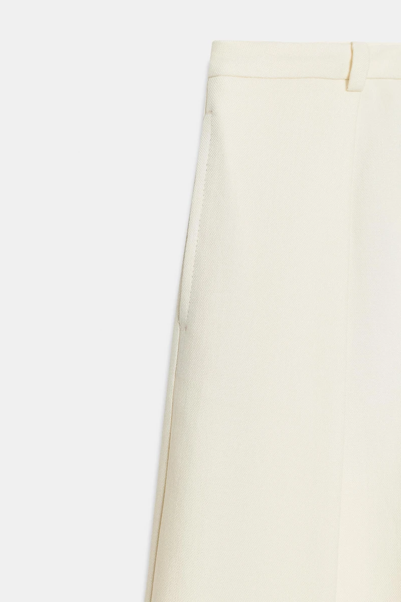 VOLUME PLEATED PANTS