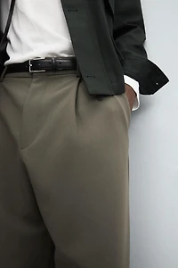 RELAXED FIT PLEATED PANTS