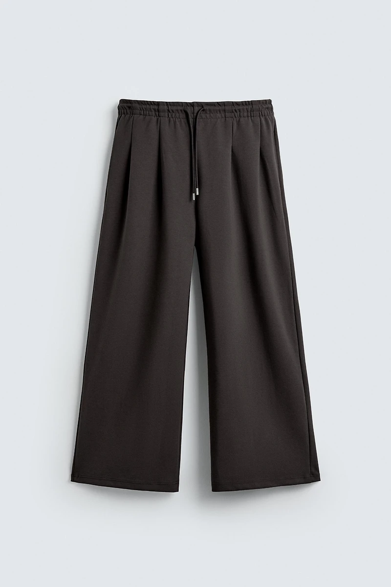 PANTALON INTERLOCK PLIS ÉTIQUETTE