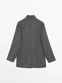 Mid-length coat with horn toggle