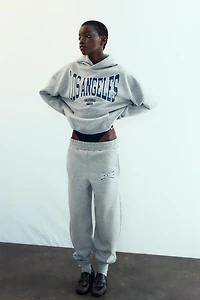 PANTALON DE JOGGING BRILLANT