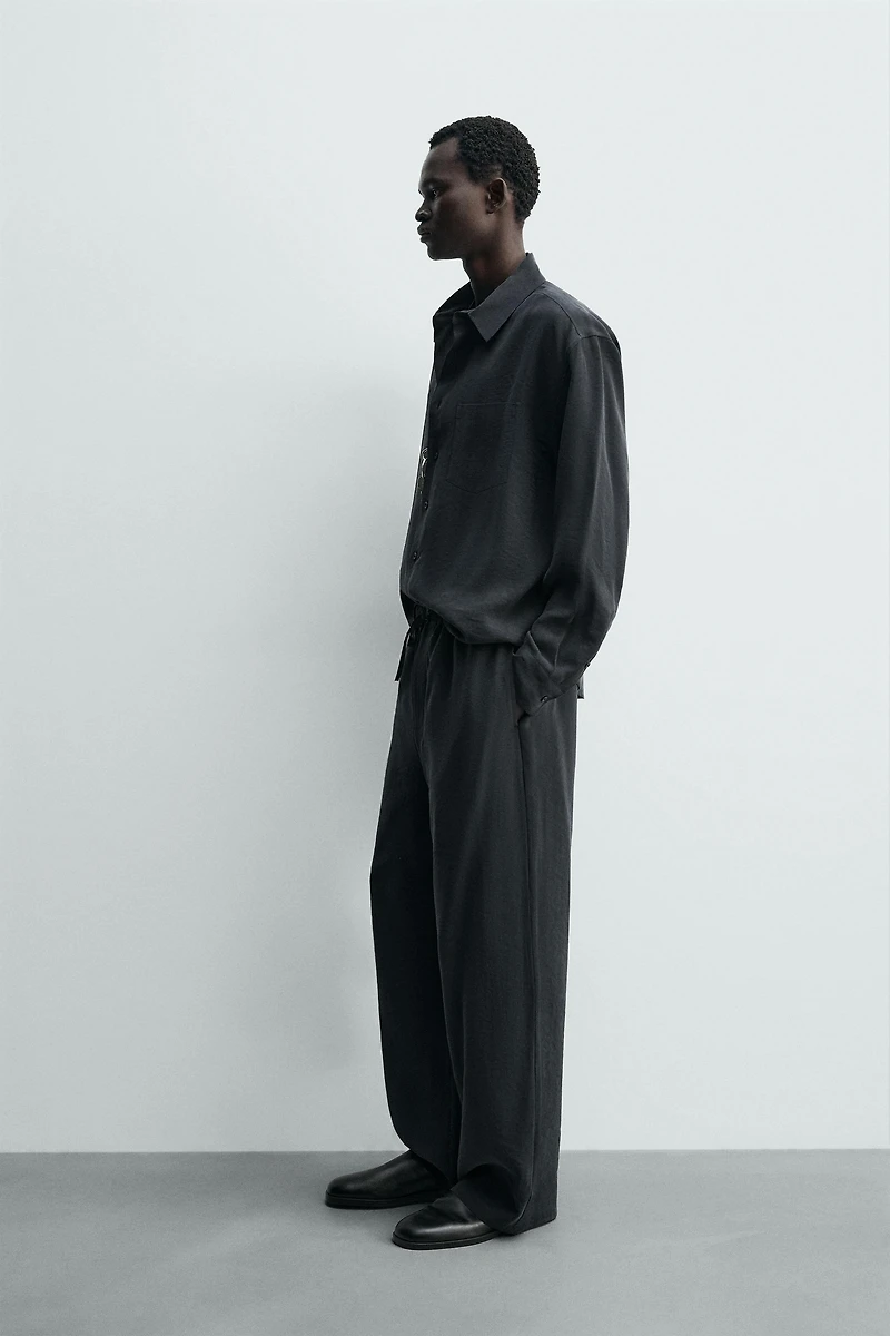 RELAXED FIT FLOWY PANTS