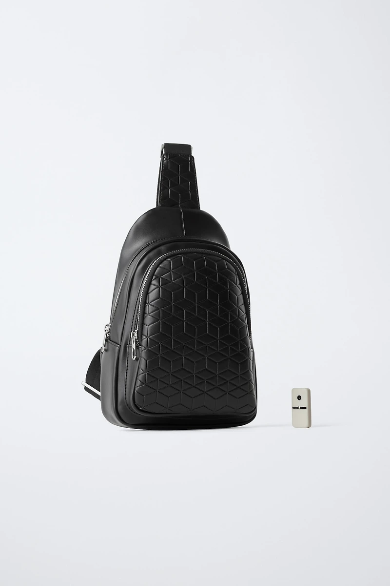 EMBOSSED CROSSBODY BACKPACK