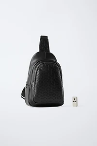 EMBOSSED CROSSBODY BACKPACK