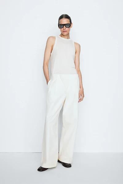 Pleated pants with crossover fastening detail - STUDIO