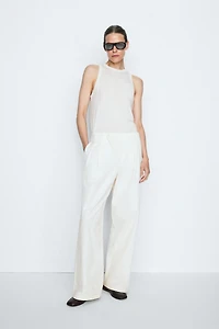 Pleated pants with crossover fastening detail - STUDIO