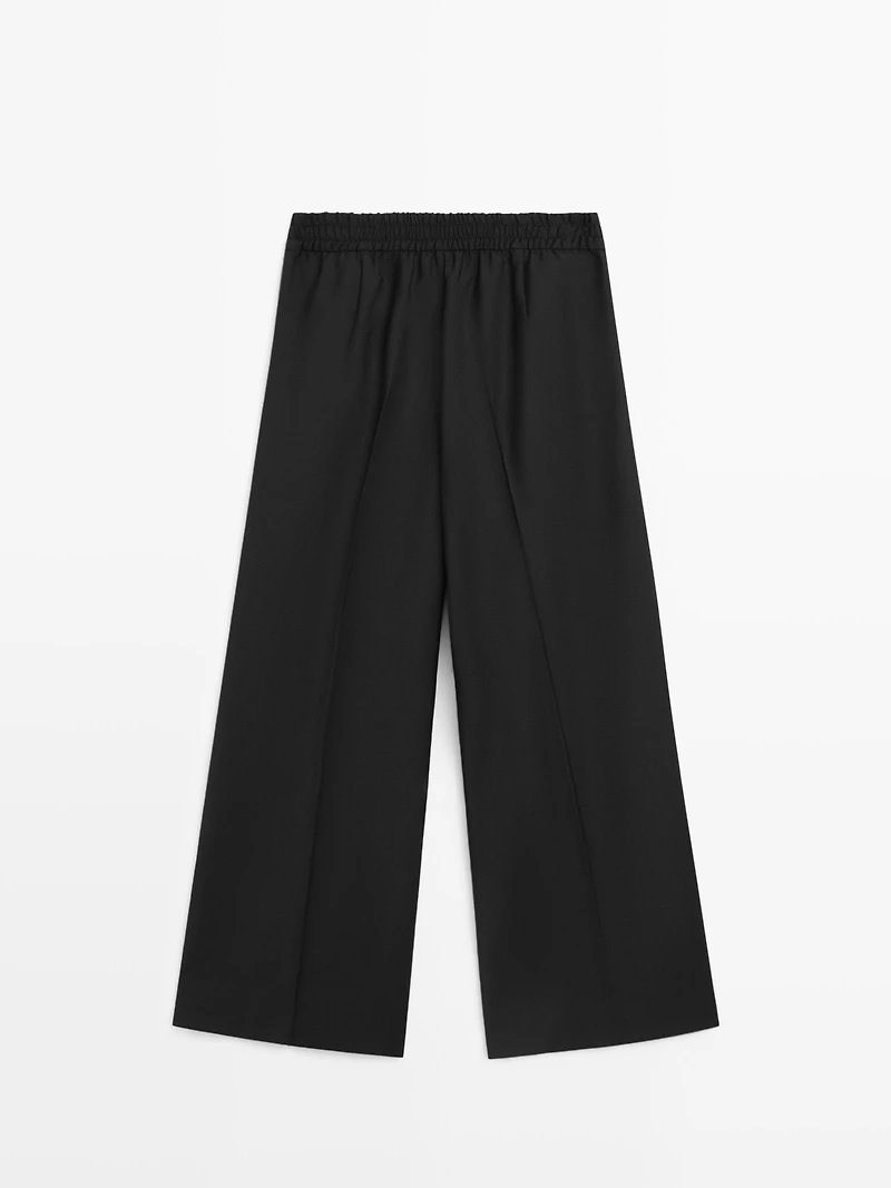 100% wool cropped wide-leg elasticated trousers