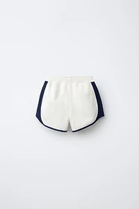 CONTRAST TEXT SHORTS