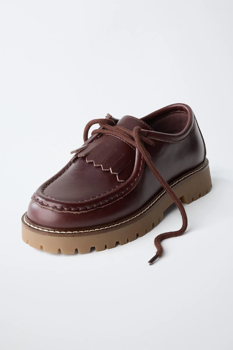 FRINGED WALLABEE SHOES