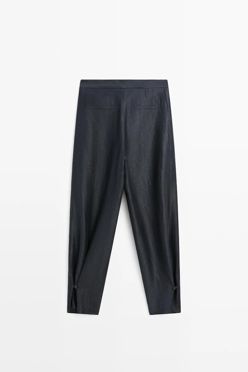 Trousers with gathered hems