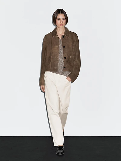 Short suede leather jacket with pocket details