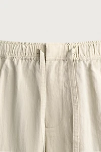 PANTALON TECHNIQUE COUPE DÉCONTRACTÉE EFFET FROISSÉ
