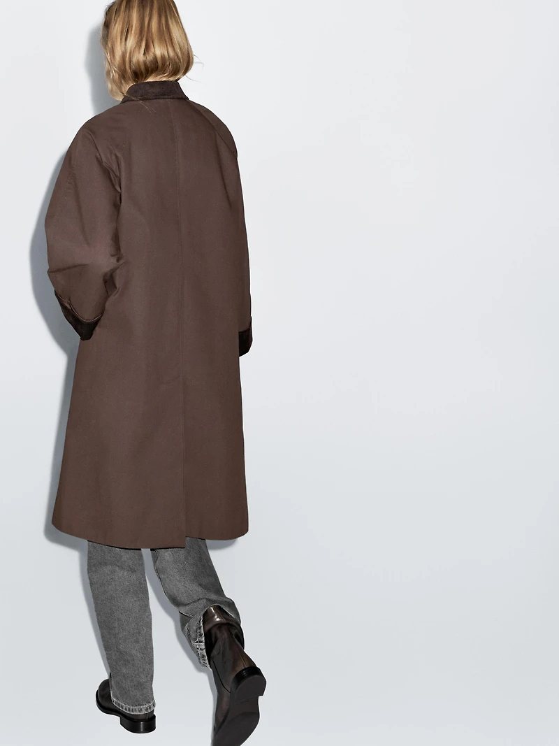 Long waxed parka with corduroy detail