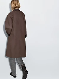 Long waxed parka with corduroy detail