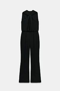 TWISTED NECK FLARE JUMPSUIT