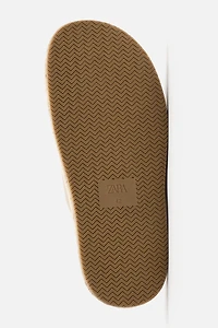 CROSSED LEATHER SANDALS