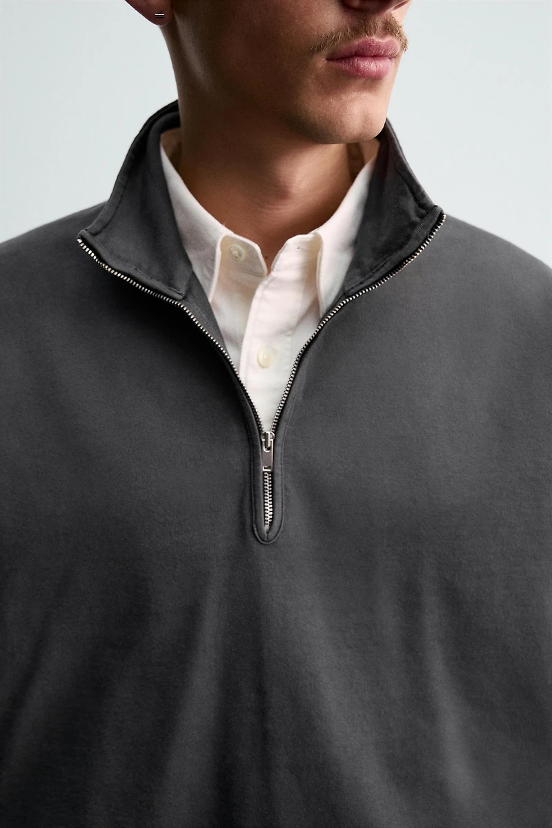 WASHED QUARTER-ZIP SWEATSHIRT