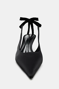 CHAUSSURES À TALONS OUVERTES L'ARRIÈRE AVEC NŒUD