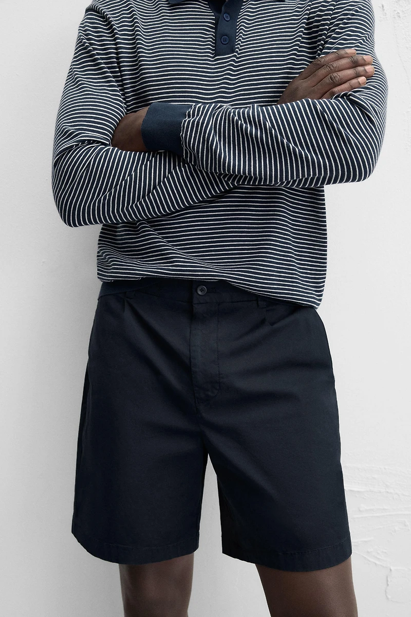 REGULAR FIT PLEATED BERMUDA SHORTS