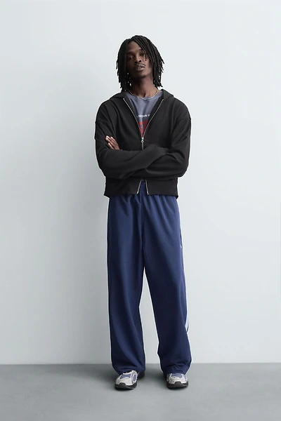 PANTALON TECHNIQUE À BANDES