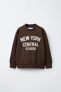 VARSITY INTERLOCK SWEATSHIRT