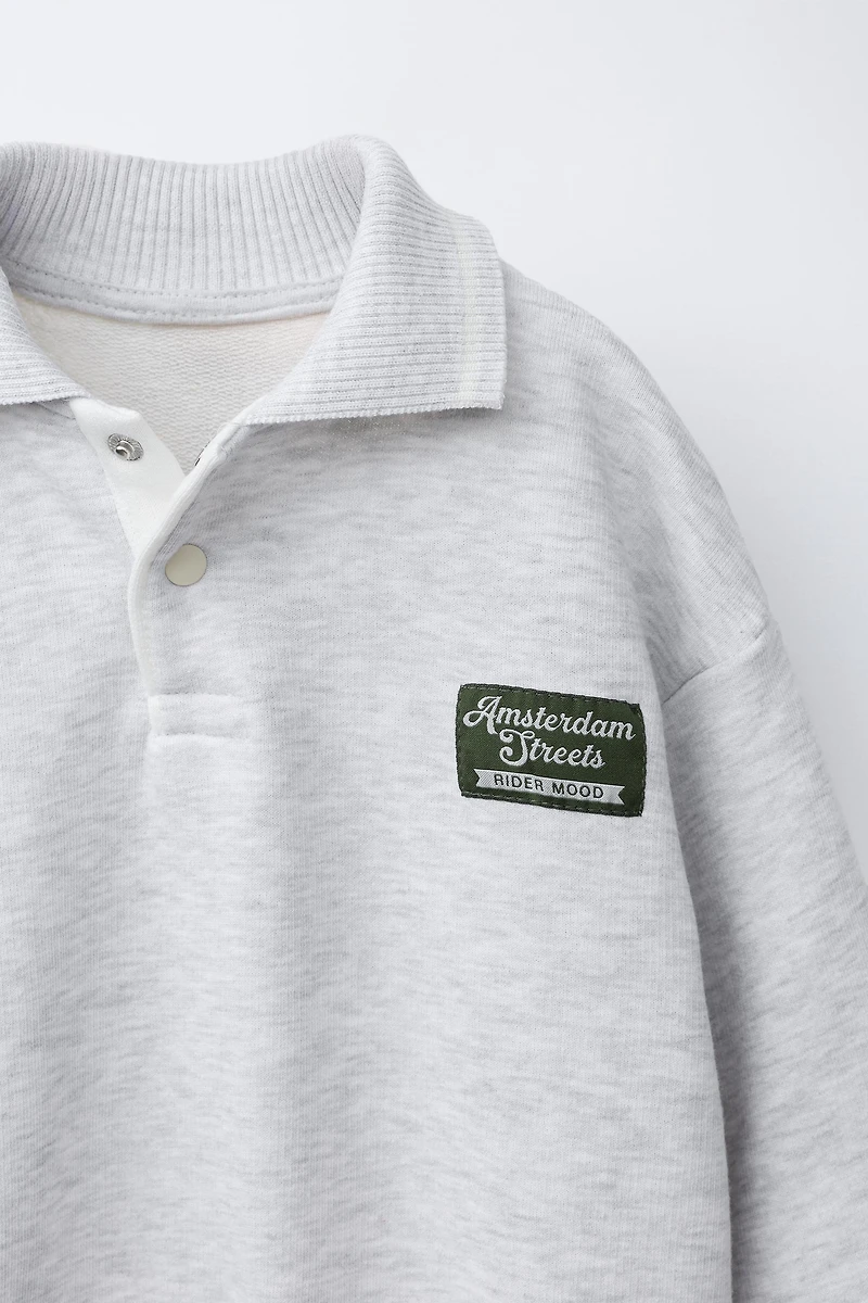 EMBROIDERED LABEL POLO SWEATSHIRT