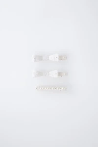 PACK OF THREE MOTHER-OF-PEARL HAIR CLIPS WITH BOWS AND PEARLS