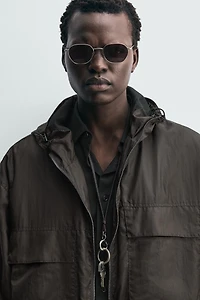 HOODED TECHNICAL JACKET