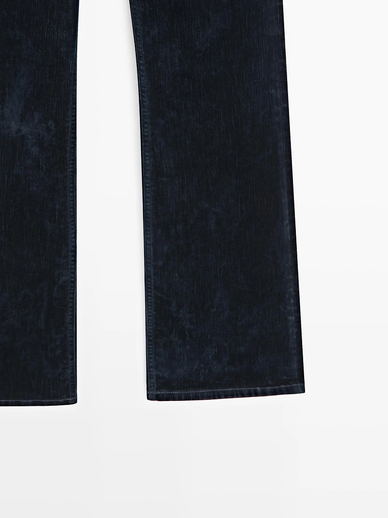 High-waist boot-cut flocked jeans