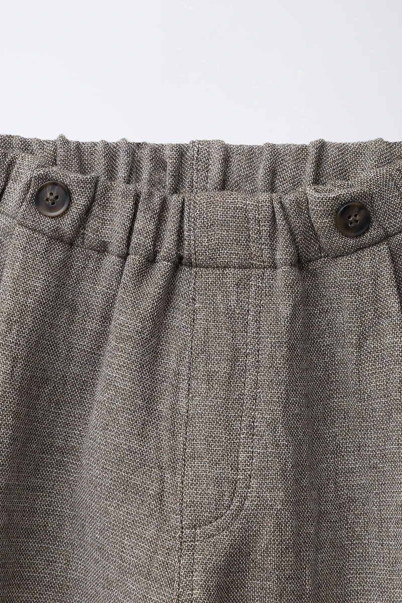 RUSTIC BAGGY PANTS WITH BUTTONS AND WOOL