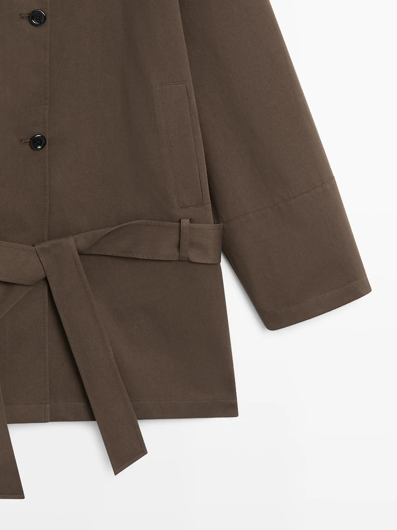 Mid-length trench coat with belt detail