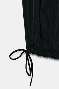 GATHERED STRAPLESS JUMPSUIT