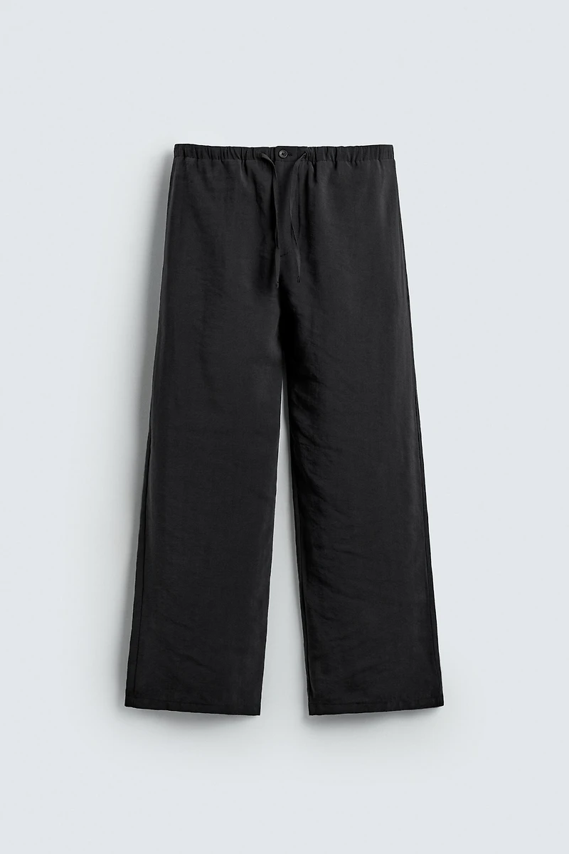 RELAXED FIT FLOWY PANTS