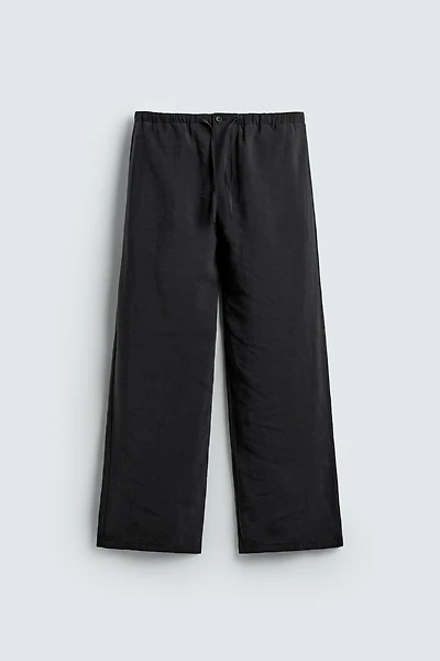 RELAXED FIT FLOWY PANTS