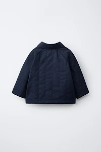 VESTE MATELASSÉE À ÉTIQUETTE