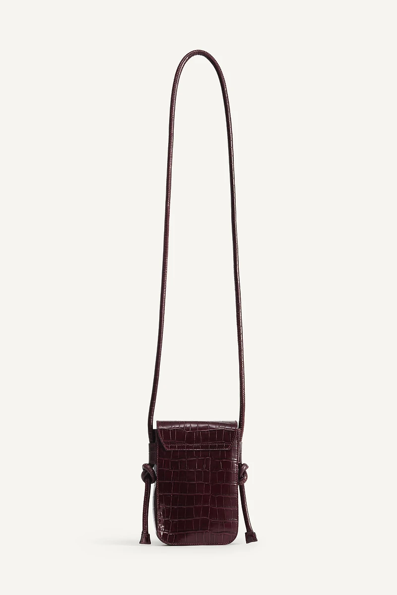 LIMITED EDITION EMBOSSED LEATHER CROSSBODY BAG