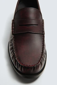 WORN PENNY LOAFERS