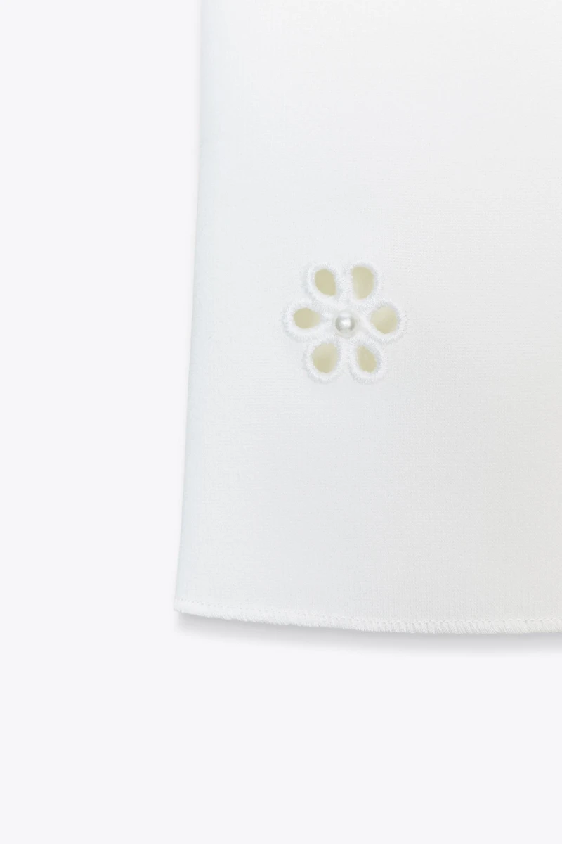 TOP STRETCH BRODERIES FLEURS